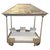 This beautiful antique daybed with its iconically shaped slatted teak canopy is a unique piece from Sumatra. The teak wood...