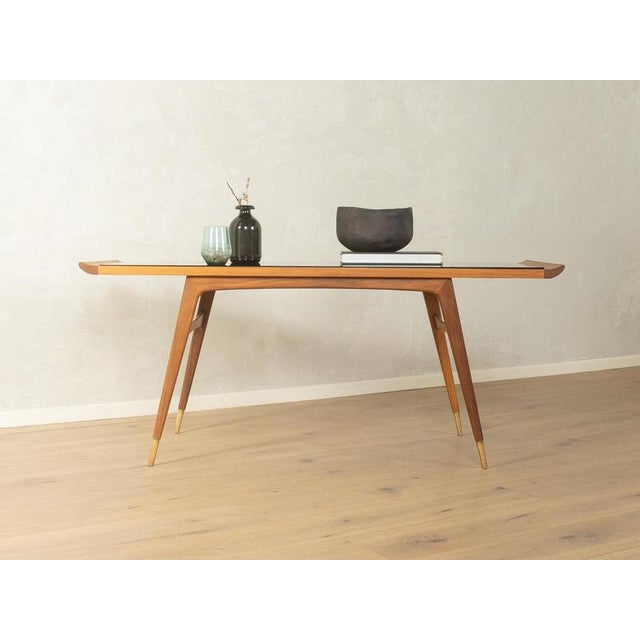 1950s Coffee Table, Ilse Möbel Made in Germany, Manufacturer: Ilse Möbel (Branding on the frame) Width: 137 cm Height: 59...