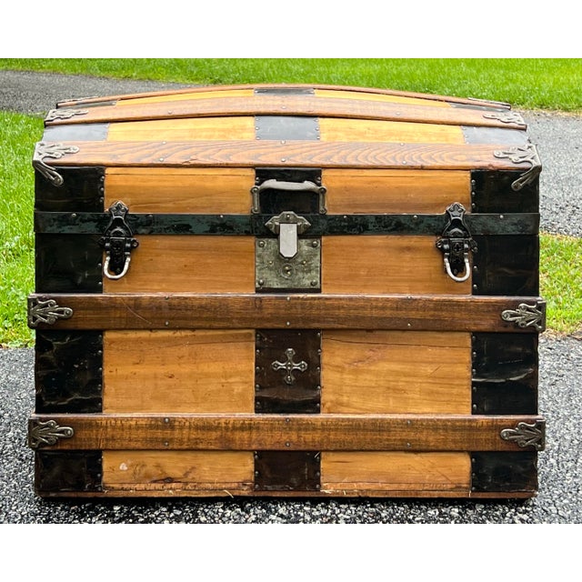Wonderful antique late 19th century done top steamers trunk. Pine dome top with oak strapping and all original metal...