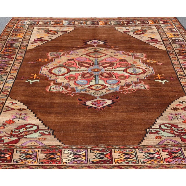 Tribal Vintage Turkish Kars Rug With Medallion on a Brown Field With Pops of Color 9'4" X 10'2" For Sale - Image 3 of 10