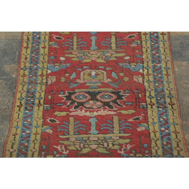 Hand-knotted in wool, this 2x9 runner is a striking addition to Rug & Kilim’s tribal rug collection. Dated 1900-1920, the...