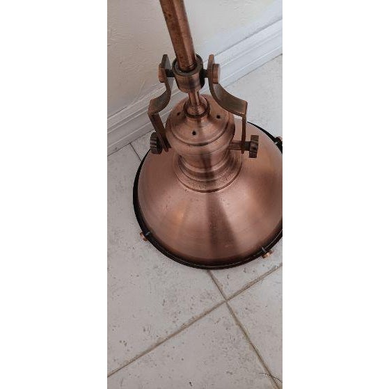 Nautical pendant light is constructed from copper and brass designed in an industrial maritime style 38"1/2 H x 12" Round...