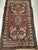 3’ 8” X 6’ 3” A triple medallion Karachov Kazak area rug from the Caucasus region woven in the 4th quarter of the 1800s....
