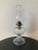 A beautiful clear glass American table oil lamp with eagle design, circa early to mid 20th century, USA. Three eagles in...