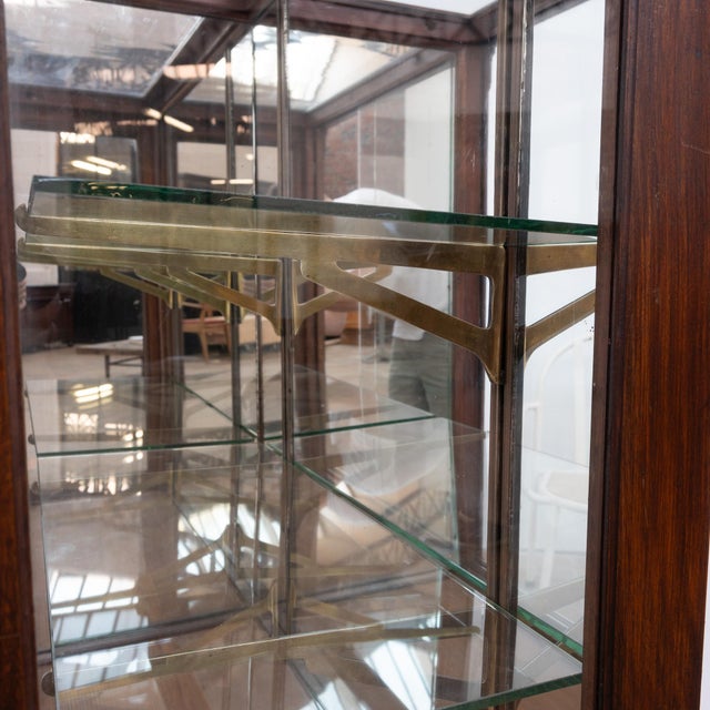 Wood, glass, and brass shop display case – early 20th century this antique beechwood display case, dating from the early...