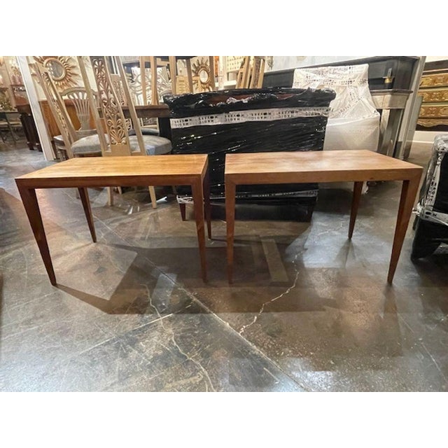 These Dutch MCM Oak Side Tables are a stylish and timeless addition to any home. With a rich brown color and original...