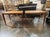 These Dutch MCM Oak Side Tables are a stylish and timeless addition to any home. With a rich brown color and original...