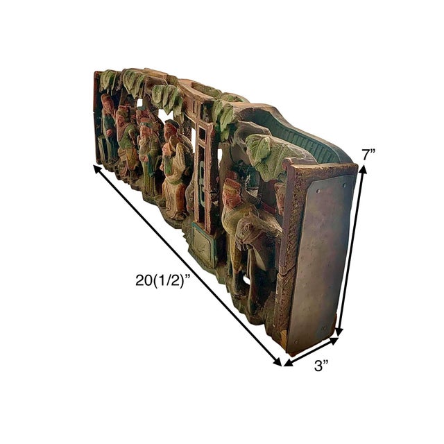This panel is a handmade, antique wooden panel wall hanging that showcases intricate hand carvings typical of Asian...