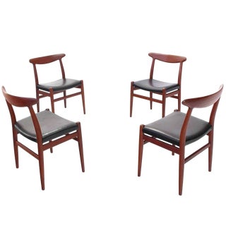 Hans Wegner Leather Upholstered Teak Dining Chairs - Set of 4 For Sale