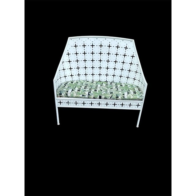This is a vintage gothic metal bench. It is in good condition. Perfect accent to a patio.