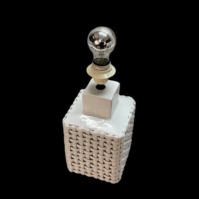 Iconic large Mid-Century white glazed ceramic lamp. It was made in Italy during the 1970s and is in the style of Tommaso...