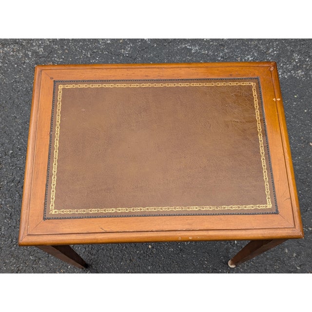 Infuse your space with classic masculine elegance and timeless English charm with this vintage mahogany side table. A...