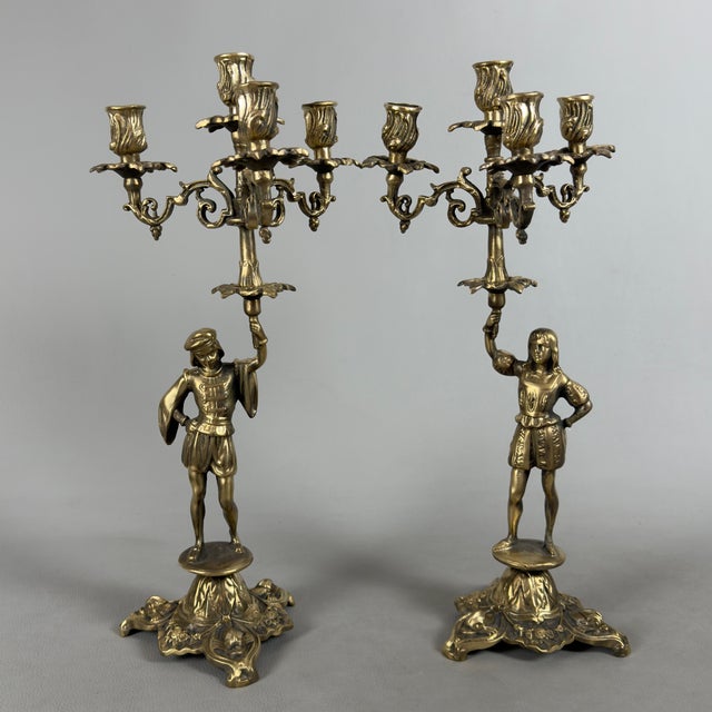 Elegant and dramatic, this pair of candelabras represents the pinnacle of Italian artistic craftsmanship. The pieces...