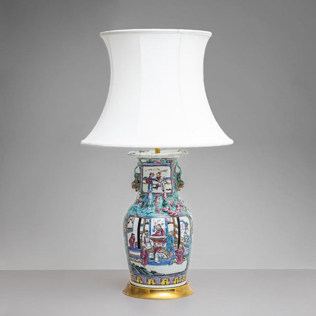 Pair of table lamps with polychrome painted porcelain vases as lamp bases and white fabric shades. European Plug (up to...