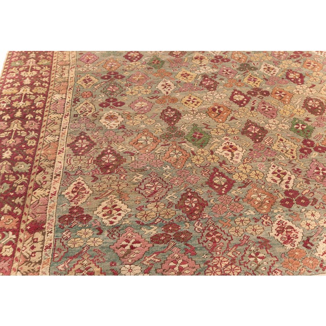 This captivating antique Turkish Ghiordes rug, crafted circa 1920, is a refined example of the classical Anatolian weaving...