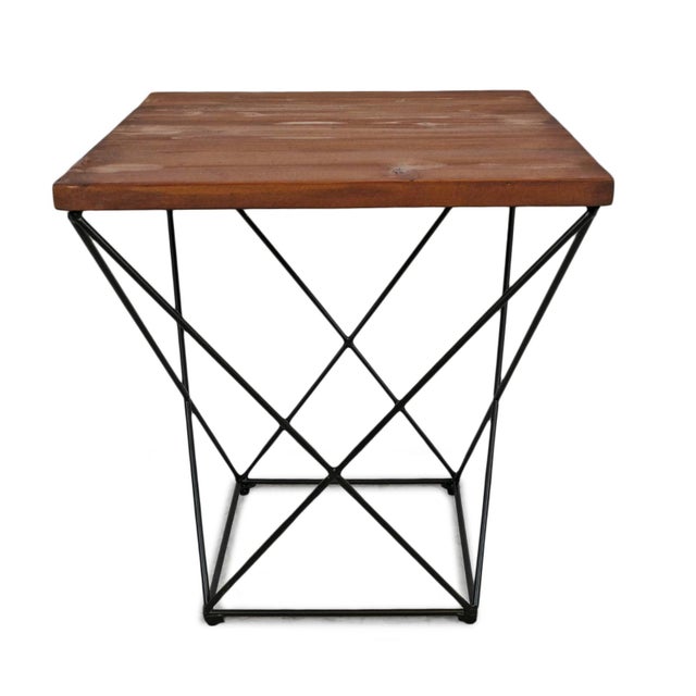 Bring warmth and architectural character to your space with this handcrafted reclaimed wood side table. A solid reclaimed...