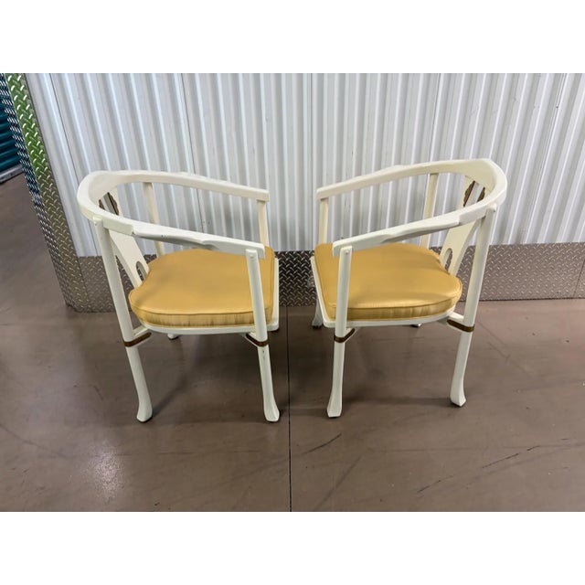 This is a beautiful pair of unique modern Asian chairs. The chairs are made by Century. They feature a horseshoe shape...