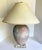 Here is an absolutely amazing table lamp from the 1980's featuring an egg shaped center base on a lucite stand with a...