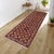 Enhance the ambiance of your home with this magnificent Persian-influenced Turkish hand-knotted rug made by skilled...