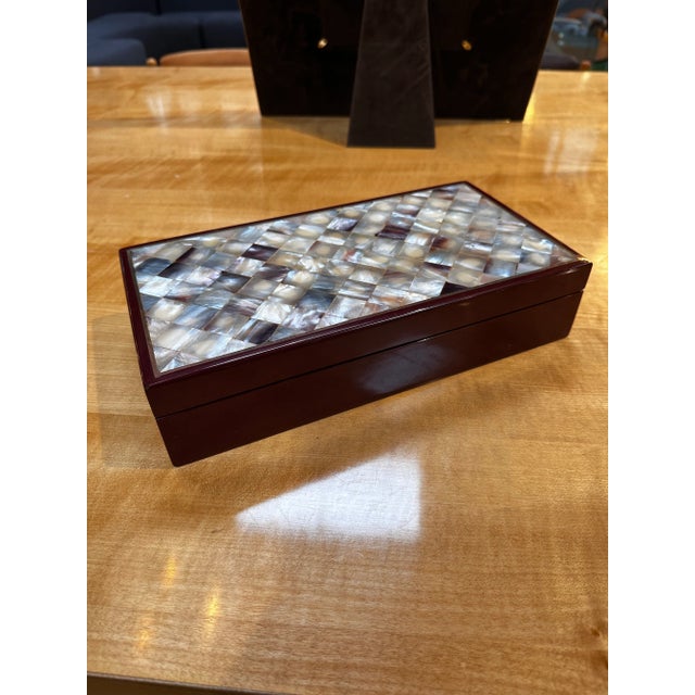 The Vintage Italian Rectangular Oversize Wood Box from the 1980s is a stylish and spacious wooden container, showcasing...