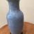 The Vintage Chinese Blue Crackle Glaze Porcelain Vase on Wood Base is a stunning piece of Asian antique artistry. Made in...