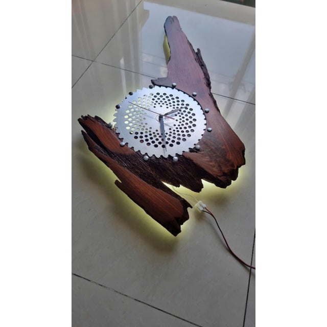 Lightning is a one-of-a-kind handcrafted wall clock sculpture created from solid hardwood burl. Inspired by the powerful...