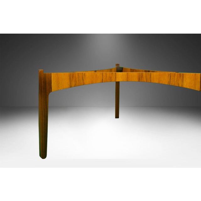 A beautiful Danish Mid Century Modern round glass coffee table Designed by Sven Ellekaer in 1961 and manufactured by...