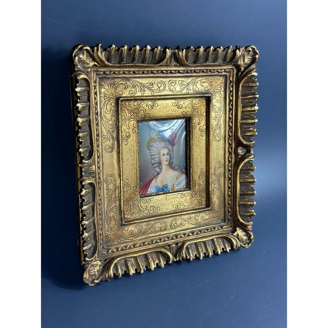 A stunning Italian miniature decorated with a hand carved wooden frame and copious amounts of gold. The miniature is made...