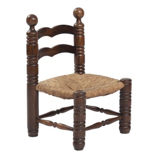 Low Brutalist Rush Chair in the style of Charles Dudoyt, 1950s For Sale