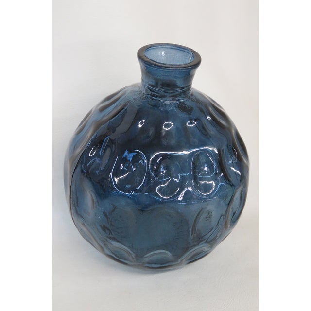 This gorgeous vintage vase is made of glass. This piece has lovely vintage Mid Century style, it features a beautiful blue...