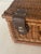Vintage handmade rattan basket with leather accents. For picnic or storage.