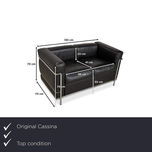 The cassina lc 2 leather loveseat in black is an iconic piece of furniture designed by le corbusier, embodying timeless...