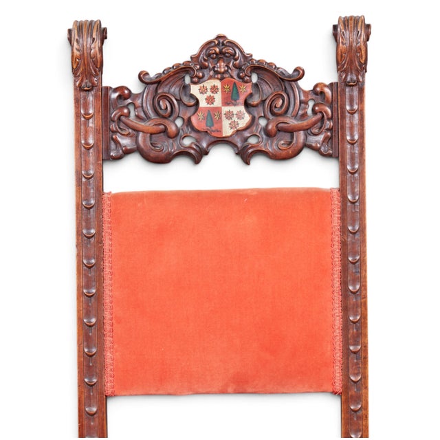 Carved Walnut Baroque High-Back Chairs With Painted Heraldic Crests — A Pair A dramatic pair of late 19th- to early 20th-...