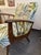 1950s armchair Impresses with its floral fabric upholstery and striking wooden armrests Woodwork refurbished Newly...