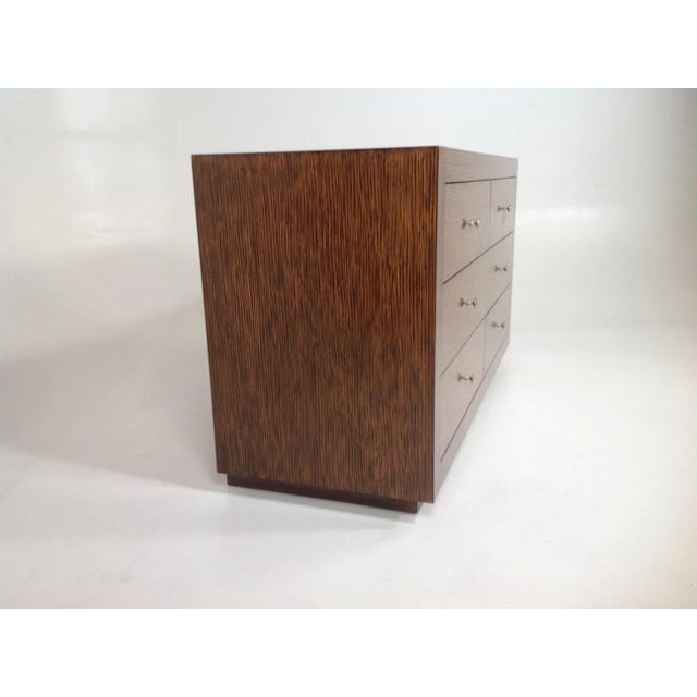 Mid century style dresser with zembrano finish. Dresser is made of alder. The finish is quite unique and is a faux...