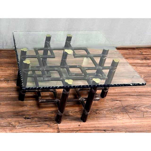 An authentic vintage mid-century organic modern coffee table designed by McGuire of San Francisco. This classic piece...