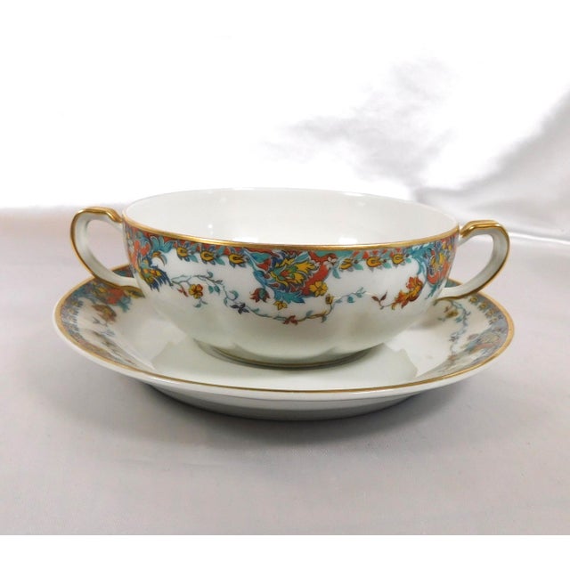 This is a set of four Haviland flat bullion cups and two underplates in the Paisley pattern from 1919. The pieces are...
