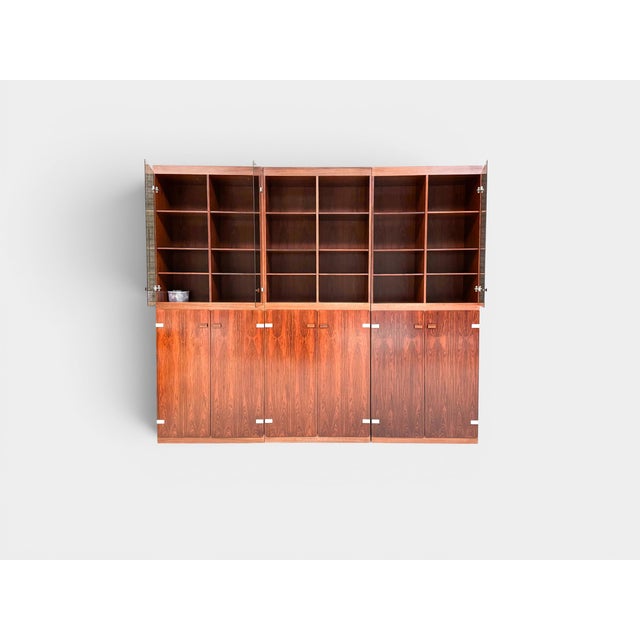 Impressive three-section modular bookcase by Sibast Møbler, attributed to Helge Sibast, and produced in Denmark during the...