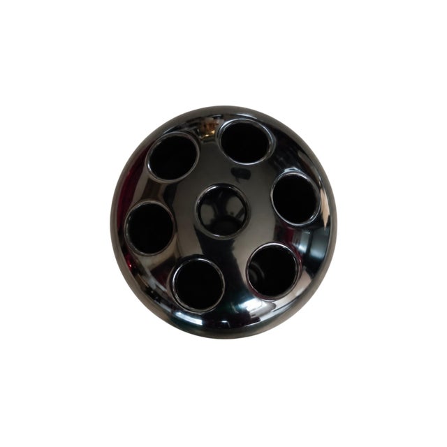 A vintage black Dedalino pencil holder designed by Emma Gismondi Schweinberger in 1966 and marked Idarco. Its glossy domed...