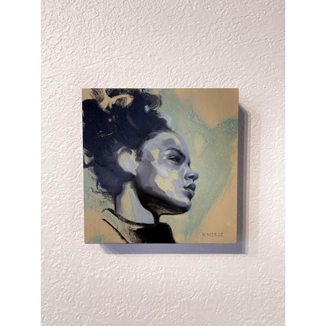 This oil on panel piece captures a striking profile of a figure, characterized by bold brushstrokes that convey both...