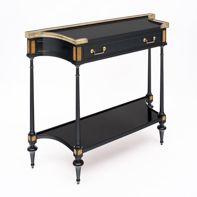 French console made of of Mahogany wood that has been ebonzied and finished in a lustrous Museum quality French polish....