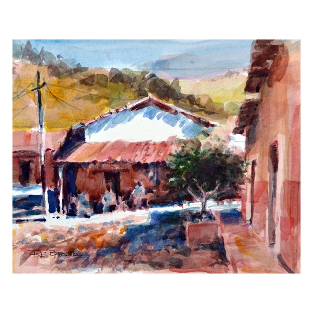 Gorgeous painting of a small town by R. E. Baker (American, 20th Century). Signed "R. E. Baker" lower left. Presented in a...