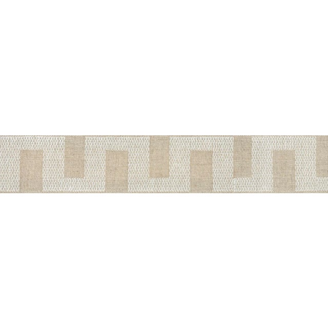 A charmingly relaxed linen tape with a geometric pattern that looks hand-stitched. Sold as a 2-yard minimum. Horizontal...
