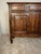 Handcrafted in France around 1900, this antique Provincial buffet showcases the enduring beauty of solid oak construction...