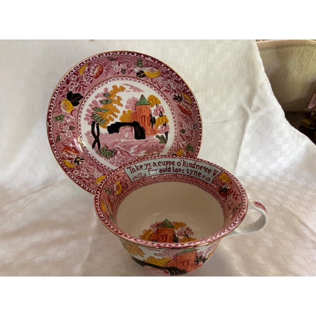 This is an exceptionally beautiful oversized Staffordshire cup and saucer. from Burslem, England. The set is hand painted...