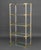 Jonathan Adler Lucite and Brass Etagere, with four glass shelves and label to base. 66.25" H x 30" W x 16" D. Provenance:...