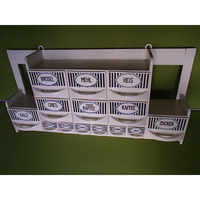 Art Deco Bauhaus Wall Spice Rack Set, Set of 17, in Very Good conditions. Designed 1920 to 1949 This piece has an...