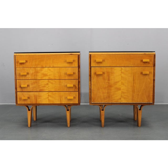 This original pair of 1960s mid-century nightstands, designed by František Mezulaník in Czechoslovakia, showcases clean...