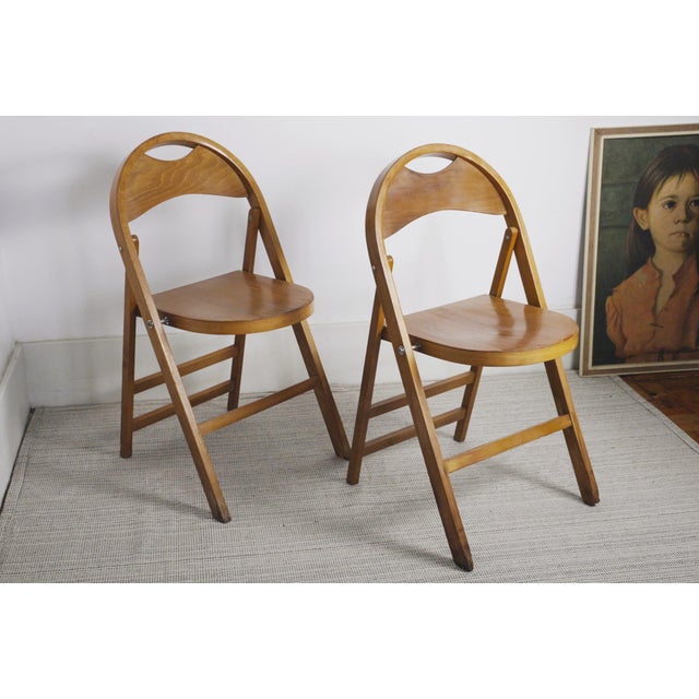 Castiglioni Tric vintage folding chairs by Bernini, designed by Achille and Pier Giacomo Castiglioni in 1965. One pair...