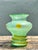 This exquisite vintage Italian hand-blown glass vase is a stunning example of artisanal craftsmanship, likely originating...